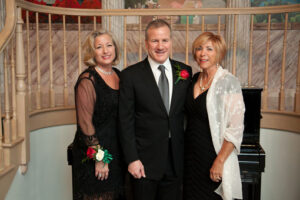 Ron and Amy Lemar and Amy Mazzolin at the 2013 Italian Cultural Center Gala. (Photo by Furla Studio)
