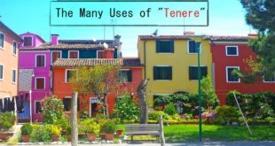 Park bench in front of homes on the island of Burano, Italy, where people can chat using the verb "tenere."